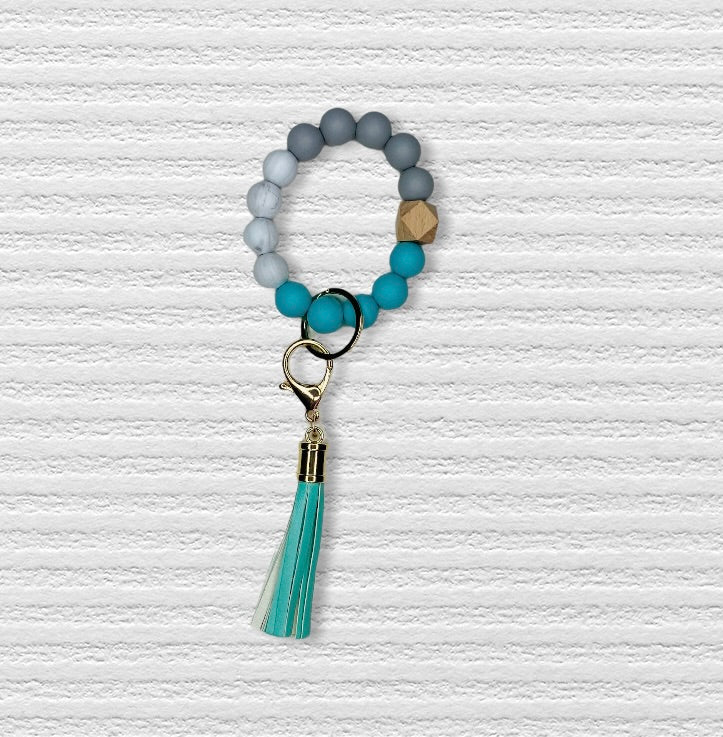 Keychains for Women Silicone Beaded Key Ring Bracelet Key Chains Women for  Car Keys Leather Tassel Bangle Wristlet Keychain  Amazonin Bags Wallets  and Luggage